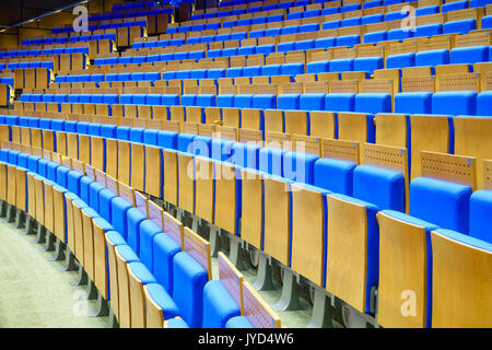 Empty blue seats at the hall Stock Photo