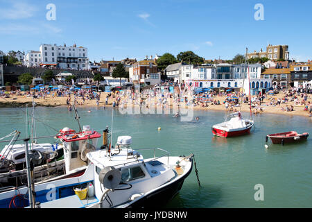 View of Viking bay beach on a sunny day with fishing boats in the foreground,, Broadstairs seaside town, Kent, England, UK Stock Photo