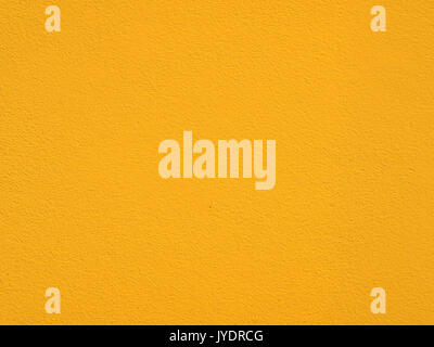 yellow wall background with cement texture Stock Photo