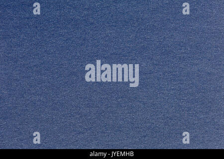 Photograph of navy blue striped pastel paper, coarse grain grunge texture sample. High quality texture in extremely high resolution Stock Photo