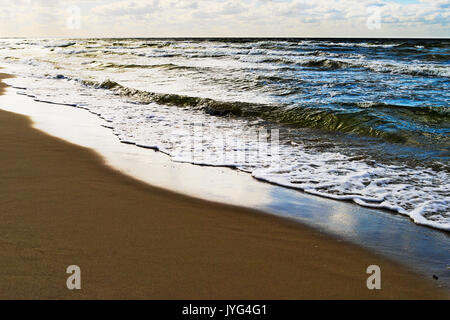 Seascape with waves breaking on the beach. Baltic sea, Pomerania, northern Poland. Stock Photo
