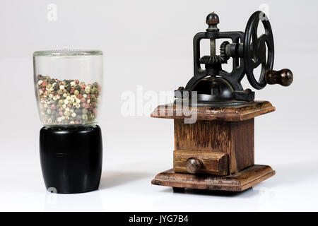 Old stylish coffee grinder on white isolated background Stock Photo