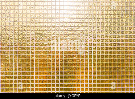 shiny golden wall tile background or golden mosaic background Stock Photo