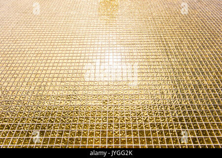 shiny golden wall tile background or golden mosaic background Stock Photo
