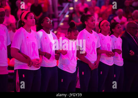 Uncasville, Connecticut, USA. 18 August, 2017. The Connecticut Sun lock arms as a sign of unity before the WNBA basketball game between the New York Liberty and the Connecticut Sun at Mohegan Sun Arena. New York defeated Connecticut 82-70. Chris Poss/Alamy Live News Stock Photo