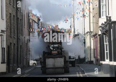 Kington, , UK. 20th Aug, 2017. The Herefordshire market town of Kington came to a standstill while a parade of vintage vehicles made their way to the Kington Vintage Club's 25th Annual Show. A 1931 Fowler DNA Steam roller steams its way down Duke Street. Credit: Andrew Compton/Alamy Live News Stock Photo