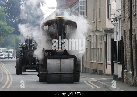 Kington, , UK. 20th Aug, 2017. The Herefordshire market town of Kington came to a standstill while a parade of vintage vehicles made their way to the Kington Vintage Club's 25th Annual Show. It is full steam ahead for a1931 Fowler DNA Steam Roller owned by Ian Mason from Hereford. Credit: Andrew Compton/Alamy Live News Stock Photo