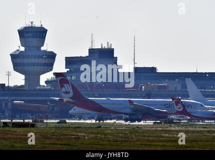 Berlin, Germany. 18th Aug, 2017. Airplanes of the insolvent airline 'Air Berlin' stand at Tegel Airport in Berlin, Germany, 18 August 2017. Photo: Paul Zinken/dpa/Alamy Live News Stock Photo