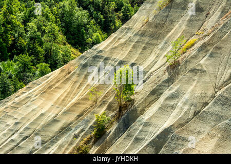 The ravine of Corboeuf, multicolored clay canyon in Rosières village, Haute Loire, Auvergne, France Stock Photo