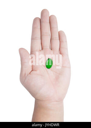 hand holding green capsule isolated on white Stock Photo