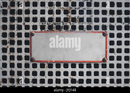 empty sign on rusty grid - blank sign on metal door Stock Photo