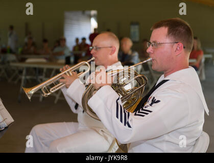 170816-N-KB426-014  BILLINGS, Montana (Aug. 16, 2017) Musician 1st Class Scott Farquhar, right, and Musician 1st Class Chris Hodges, left, both assigned to Navy Band Northwest, perform at ZooMontana during Navy Week Montana. Navy Week programs serve as the principal outreach effort into areas of the country without a significant Navy presence, helping Americans understand that their Navy is deployed around the world, around the clock, ready to defend America at all times. (U.S. Navy photo by Mass Communication Specialist 2nd Class James Vazquez/Released) Stock Photo