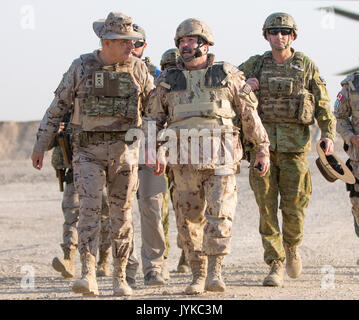 Spanish army Brig. Gen. D. Luis Martín-Rabadán, Commander Task Force Besmayah, left, walks with Canadian Brig. Gen. Steve Whelan, Combined Joint Task Force-Operation Inherent Resolve, CJ7, center, and Australian Brig. Gen. Rupert Hoskin, Combined Joint Task Force-Operation Inherent Resolve, director CJ5, right, during a battlefield circuit at the Besmaya Range Complex, Iraq, August 9, 2017. The Besmaya Range Complex is one of four Combined Joint Task Force - Operation Inherent Resolve building partner capacity locations dedicated to training partner forces and enhancing their effectiveness on  Stock Photo