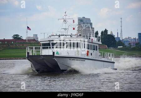 The newly-constructed Survey Vessel CATLETT is pictured August 16, 2017, in front of the Fort McHenry National Monument and Historic Shrine with part of downtown Baltimore visibile in the background. Survey Vessel CATLETT, named after the late Harold Catlett, a longtime hydrographic surveyor with the U.S. Army Corps of Engineers, Baltimore District, will support Baltimore District's navigation mission, including conducting hydrographic surveys of channels associated with the Port of Baltimore. Stock Photo