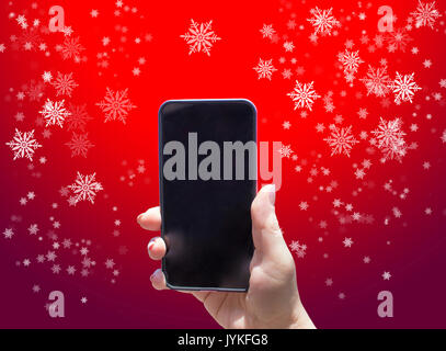 The phone in hand on the red background Stock Photo