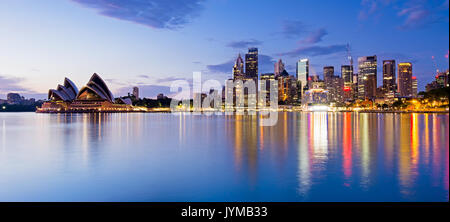 Sydney skyline and reflection during sunrise, New South Wales Australia Stock Photo