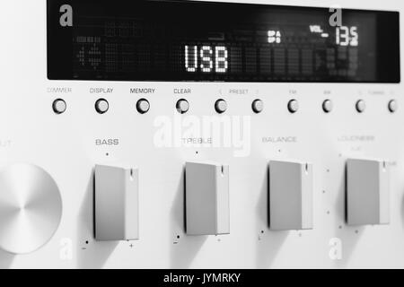 Silver sound amplifier receiver front panel display Stock Photo