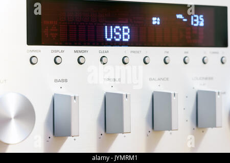 Silver sound amplifier receiver front panel display Stock Photo