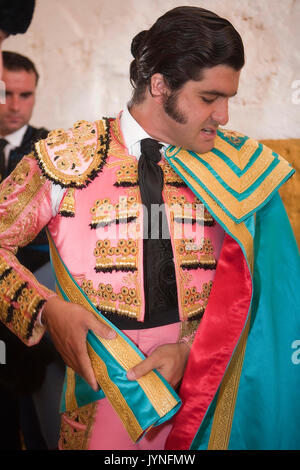 Bullfighter Morante de la Puebla lights a cigar before the bullfight at