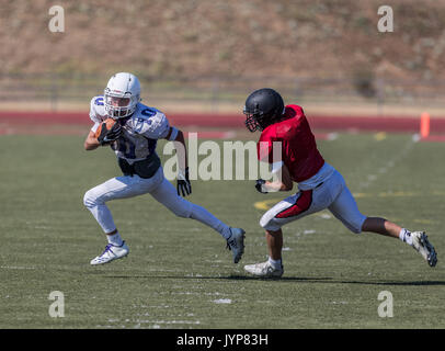 Football action with Shasta at Foothill High School in Palo Cedro, California. Stock Photo