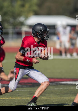 Football action with Shasta at Foothill High School in Palo Cedro, California. Stock Photo