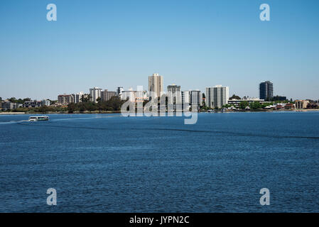 South Perth view from Elizabeth Quay Bridge with ferry crossing Swan River towards Mend Street jetty, Western Australia Stock Photo