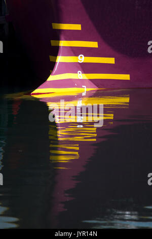 Bow of Boat Reflected in Water Stock Photo
