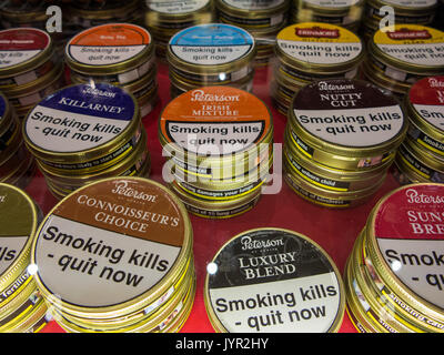 Multiple tins of different flavoured pipe tobacco Stock Photo