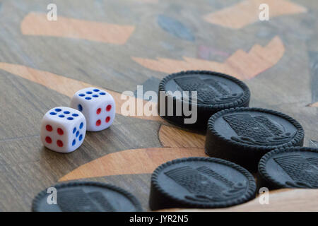 Board for a game of backgammon with two dice Stock Photo
