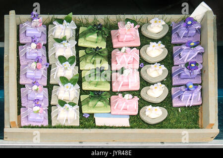 Natural hand made soap cosmetics on market stall Stock Photo