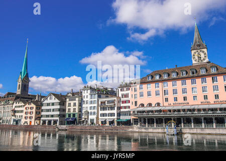 Panorama view to the Limmat and the Sankt Peters Church and the  Frau Munster Church in Zurich Switzerland Stock Photo