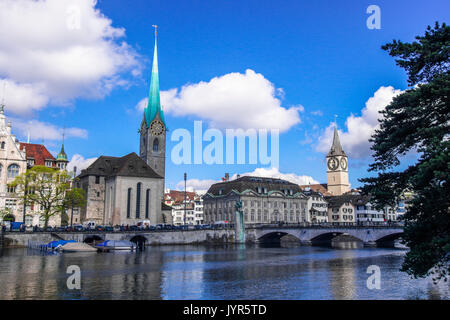 Panorama view to the Limmat and the Sankt Peters Church and the  Frau Munster Church in Zurich Switzerland Stock Photo