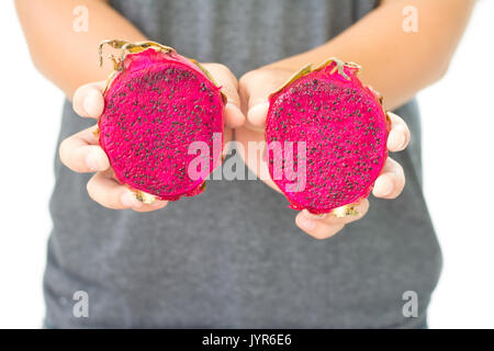 Red dragon fruit in hand isolated on white background Stock Photo