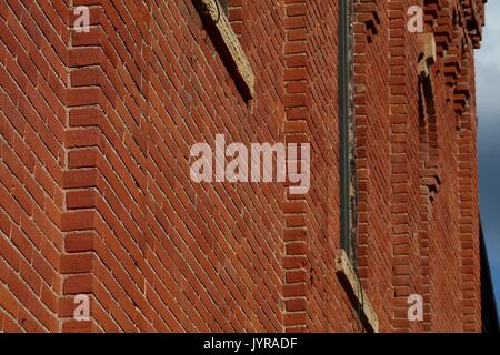 Nineteenth century brick building facade from an angle Stock Photo