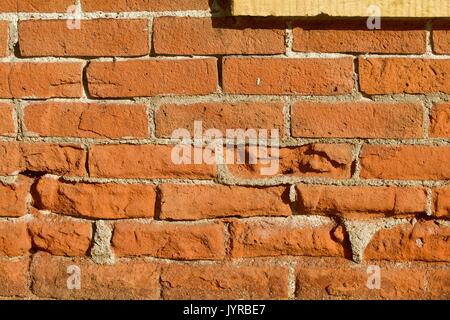 Nineteenth century brick wall with limestone frame Stock Photo