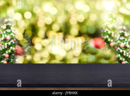 Premium Photo  Wooden tabletop with cutting board and blurred kitchen with  christmas tree background for display or montage your products