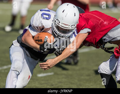 Football action with Shasta at Foothill High School in Palo Cedro, California. Stock Photo