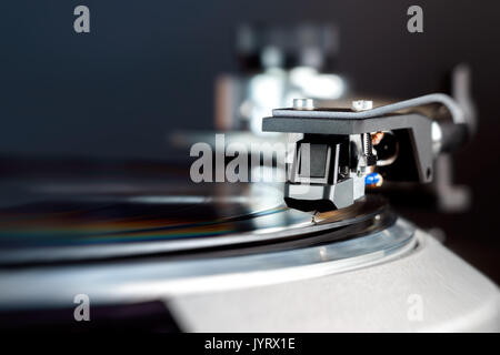Turntable with black  Headshell Cartridge in action, dj, audio Stock Photo