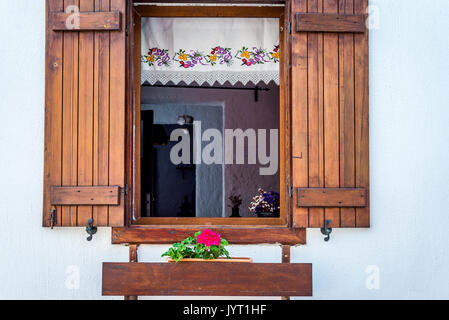 Old window with wooden shutters Stock Photo
