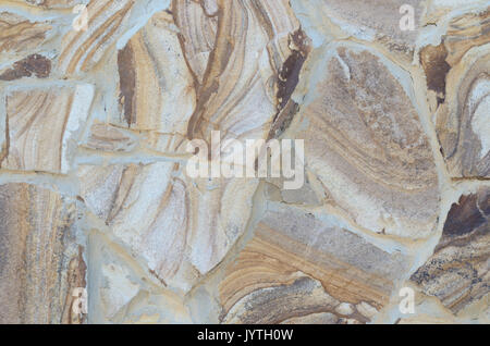 Wild granite brick wall. Backdrop for grunge design. Grunge design backdrop Stock Photo