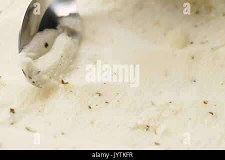 closeup of scooping lemon mint sorbet with spoon Stock Photo