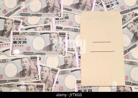 Japanese money and salary envelope on white background Stock Photo