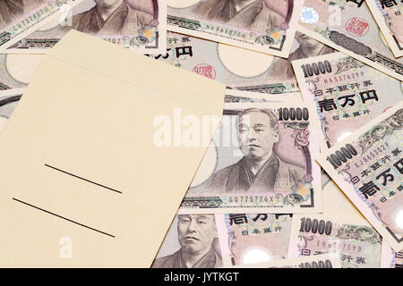 Japanese money and salary envelope on white background Stock Photo