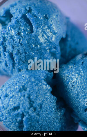 scooped balls of blue ice cream close up Stock Photo