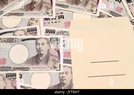 Japanese money and salary envelope on white background Stock Photo