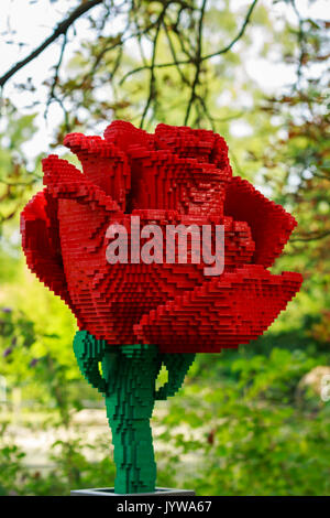 Planckendael zoo, Mechelen, Belgium - AUGUST 17, 2017 : Red rose from lego bricks in exhibition 'Nature Connects' by Sean Kenney (seankenney.com) Stock Photo
