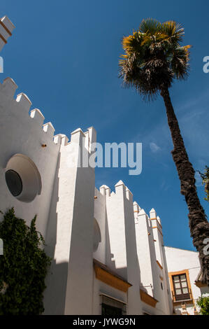 Spain: architectural details of the Alcazar of Seville, the famous royal palace, one of the most outstanding examples of mudejar architecture Stock Photo