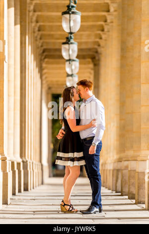 Couple kissing at the Palais Royal Stock Photo