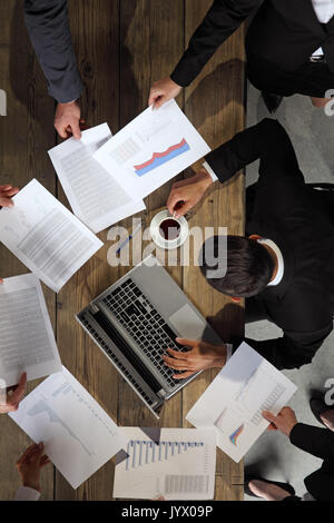 Business man getting extra work from coworkers, deadline concept Stock Photo