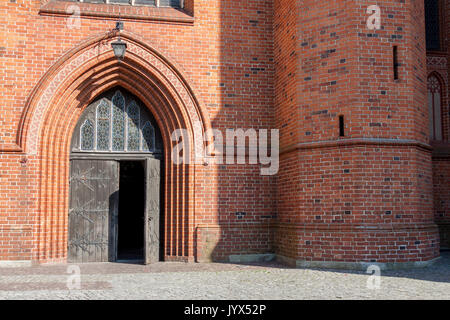 Fragment of the wall and the entrance to Cathedral in Pelplin -  Poland (Kociewie Region) Stock Photo